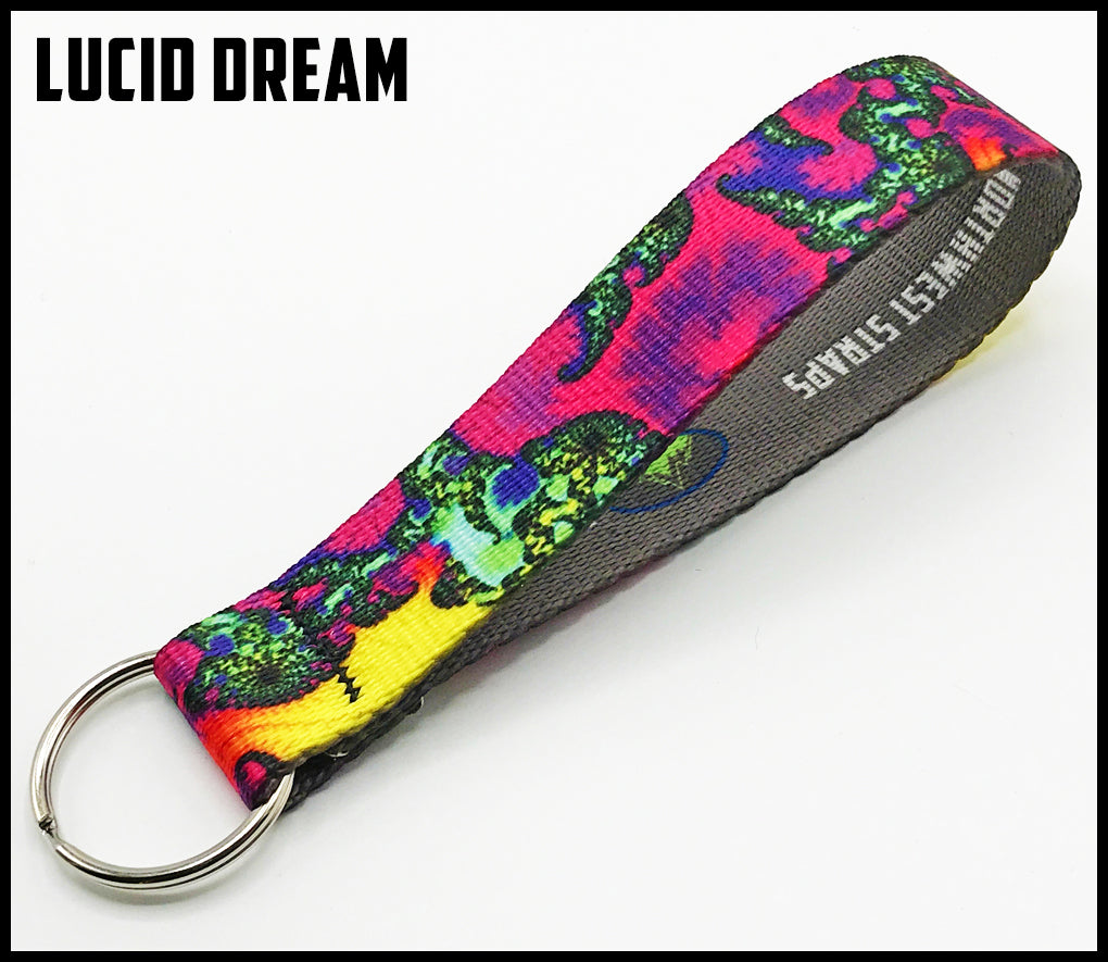 Lucid dream. Red yellow blue green and black trippy design. 1 inch custom picture quality polyester webbing keyfob. Design by Northwest Straps.