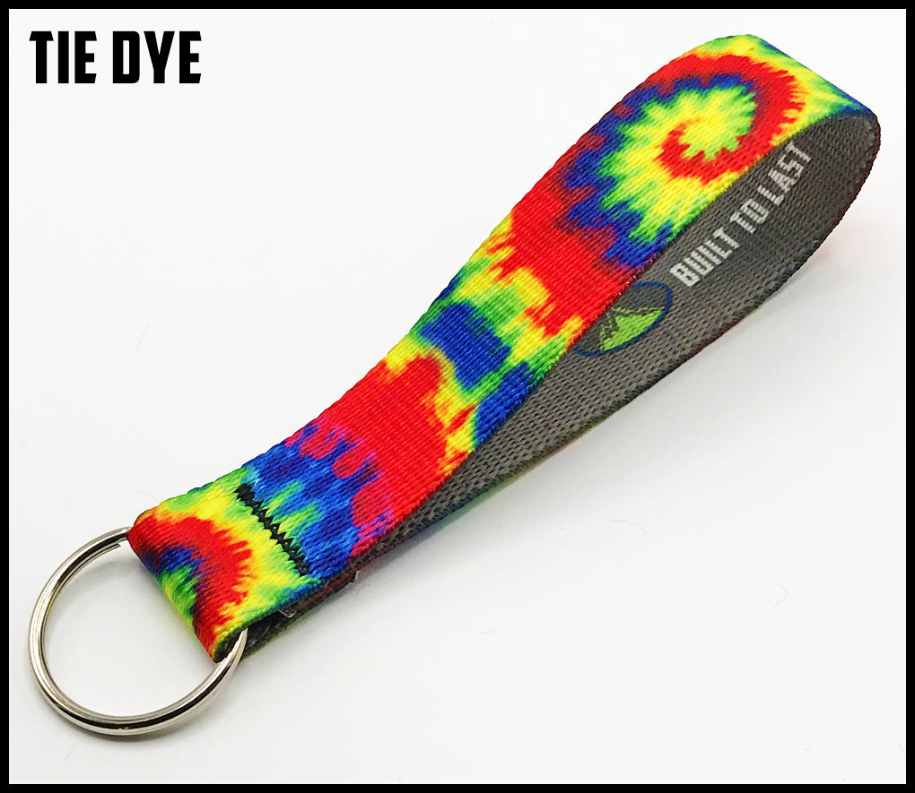Red blue green yellow tie dye. 1 inch custom picture quality polyester webbing keyfob. Design by Northwest Straps.