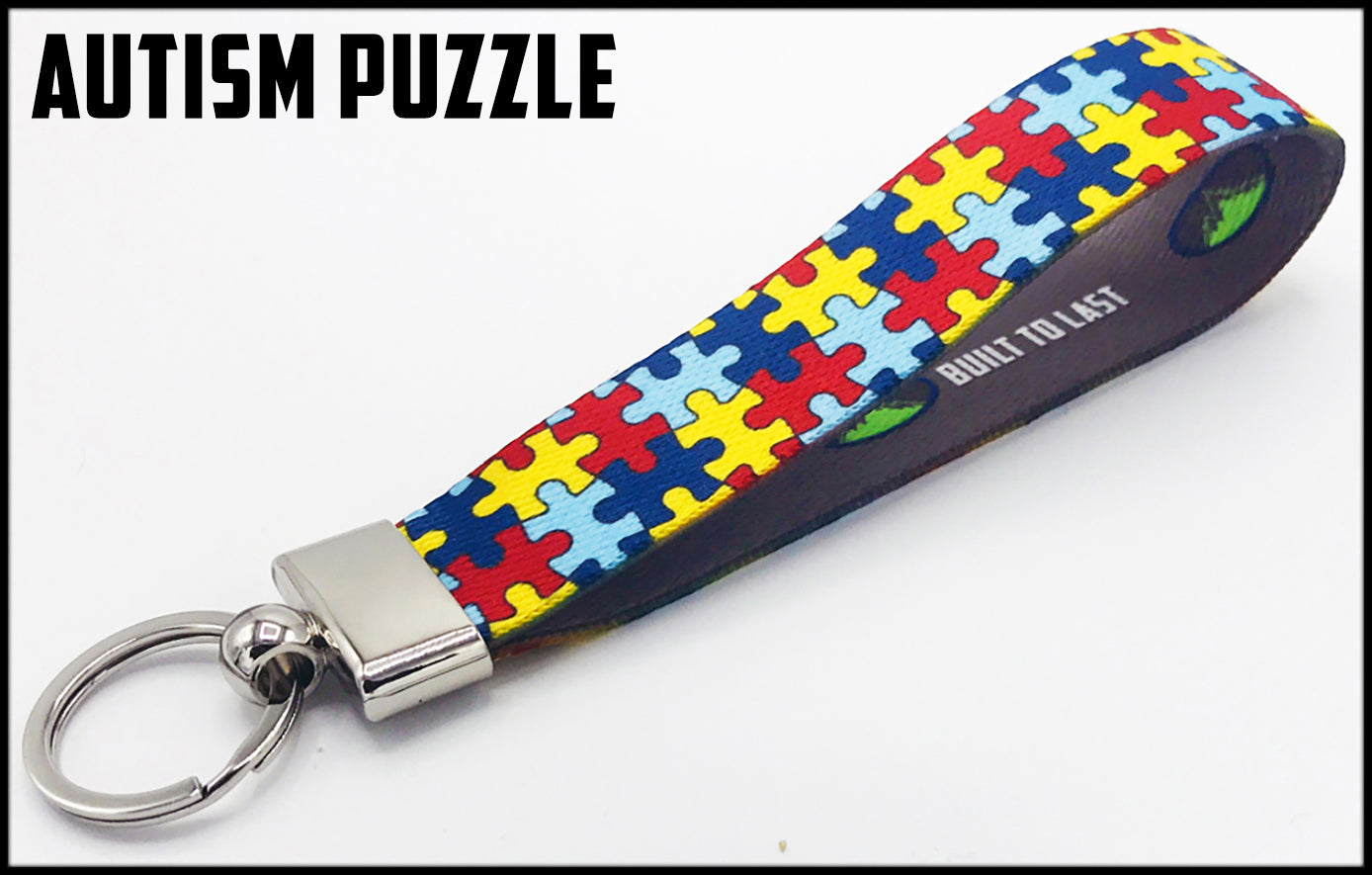 Autism puzzle 1 inch custom picture quality polyester webbing keyfob. Design by Northwest Straps.