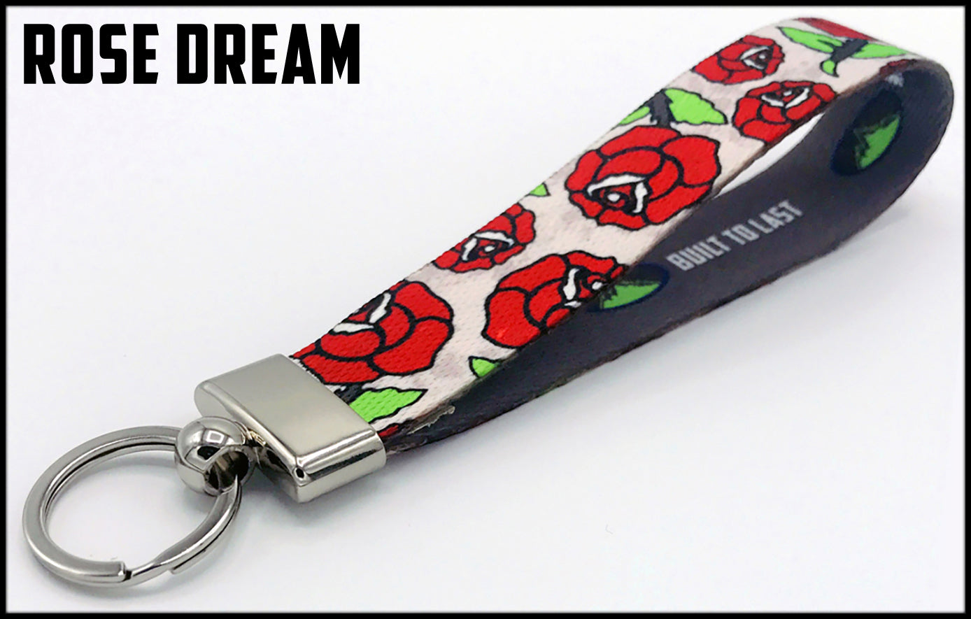 Red drawn roses on white background. 1 inch custom picture quality polyester webbing keyfob. Design by Northwest Straps.