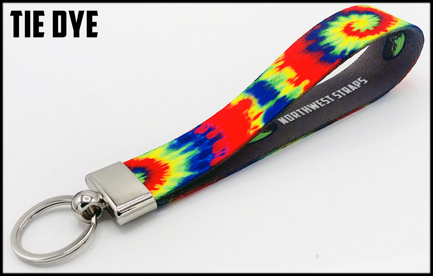 Red green yellow blue tie dye. 1 inch custom picture quality polyester webbing keyfob. Design by Northwest Straps.