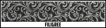 Silver on black filigree.  1 1/2 Inch custom picture quality polyester webbing. Design by Northwest Straps.
